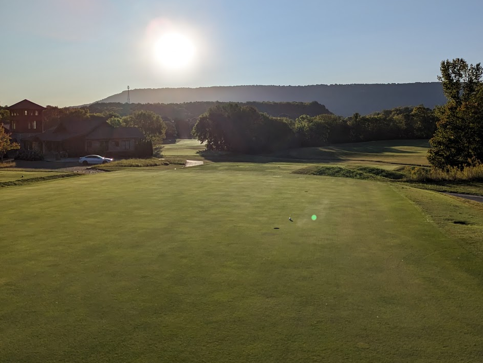 A photo of the sun rising over Black Creek Club