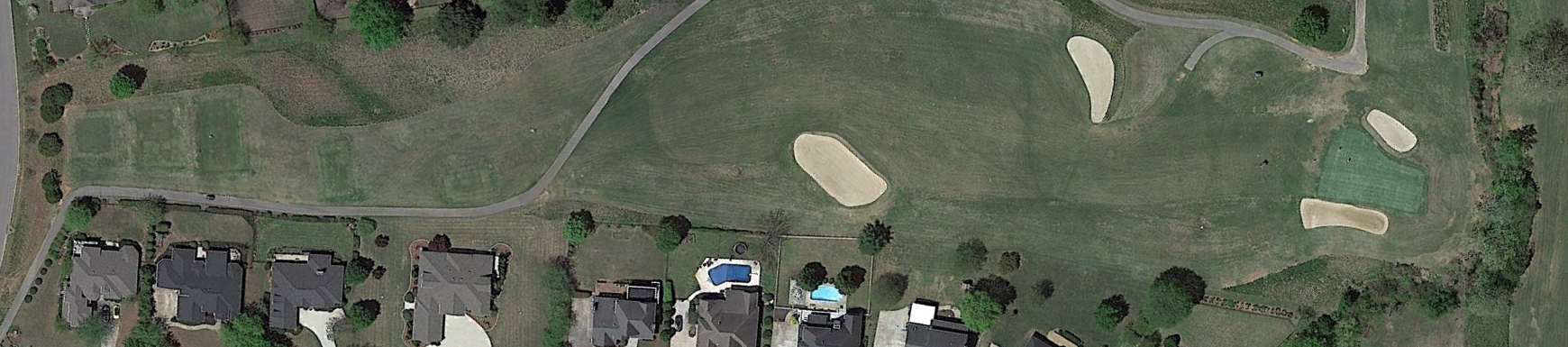 A photo of Black Creek Club's first hole from the overhead view