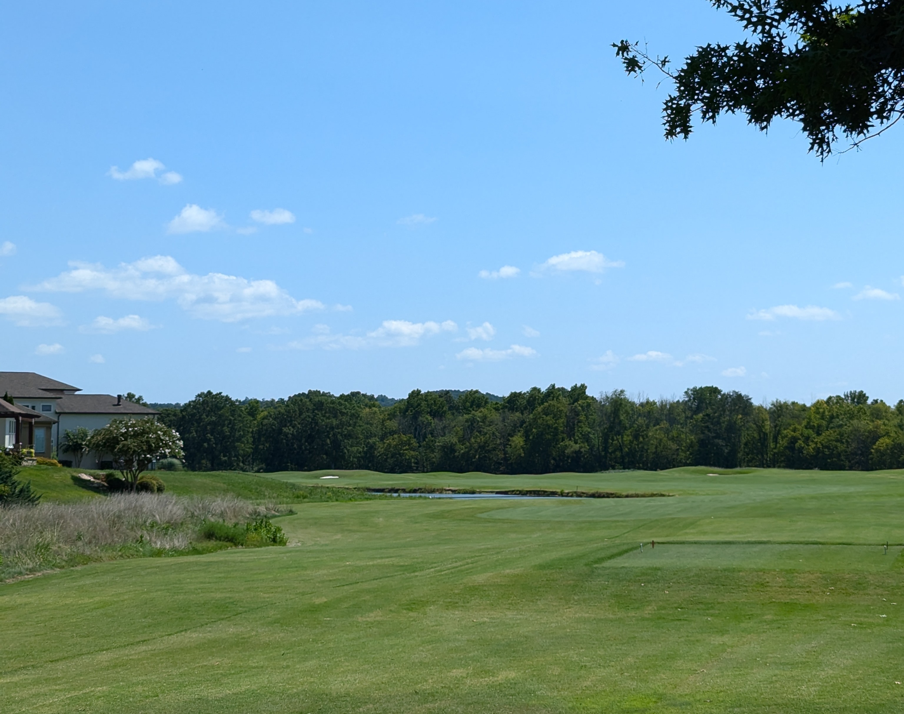 The tee shot at thirteenth hole at Council Fire Golf Club