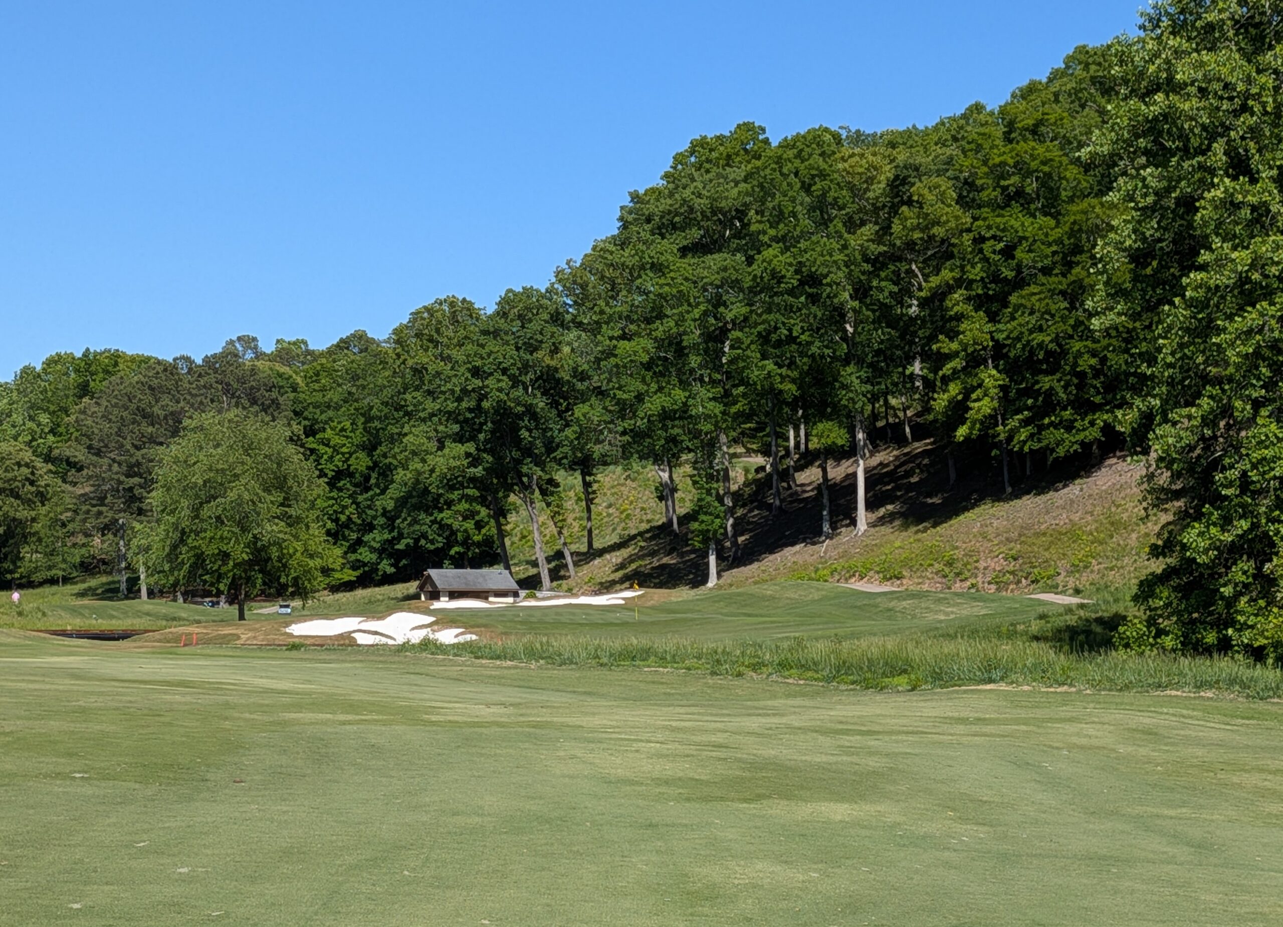 The approach shot at the thirteenth hole at The Standard Club