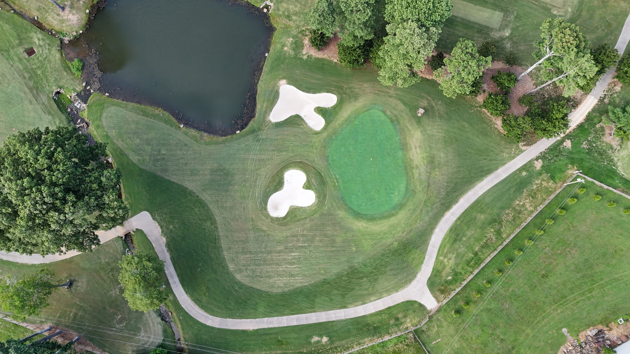 The seventeenth green at Turtle Point Yacht & Country Club from above
